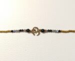 Pulseras Negra/Blanca OM