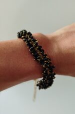 Pulsera cuentas negras y doradas