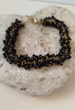 Pulsera cuentas negras y doradas