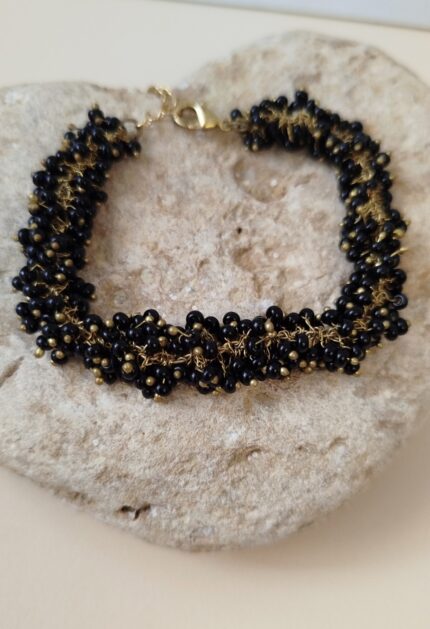 Pulsera cuentas negras y doradas
