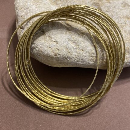 Pulsera rígida - Hilos dorados entrelazados