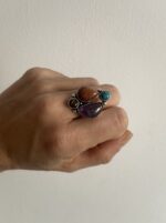 Anillo con 4 piedras en diferentes alturas y base ajustable de plata